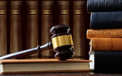 judge-gavel-on-a-book-law-books-background-wooden-desk-e1622361337922